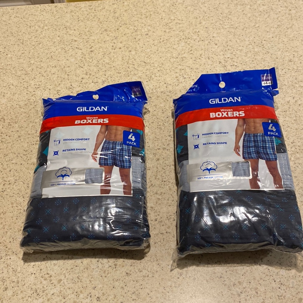 Two packages of 4 count Gilden woven premium cotton boxers. 8 boxers total. New.